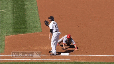 A gif of Rockies' Todd Helton doing the hidden ball trick on a Cardinals player.
